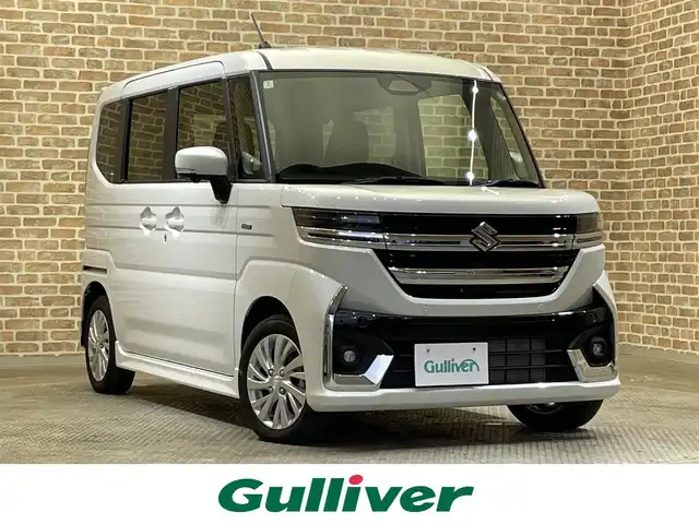 スズキ スペーシア カスタム HYBRID GS 岩手県 2024(令6)年 0.3万km ピュアホワイトP ４WD/全方位モニター/左側パワースライドドア/スズキセーフティサポート/デュアルセンサーブレーキサポートII/車線逸脱抑制機能/アダプティブクルーズコントロール/車線維持支援機能/誤発進抑制機能/先行車発信お知らせ機能/標識認識機能/ハイビームアシスト/ブレーキホールド機能/パーキングセンサー/横滑り防止装置/アイドリングストップ/マニュアルレベリングLEDヘッドランプ/LEDランプ/純正14インチアルミホイール/ロールサンシェード/前席シートヒーター/純正メモリナビ/フルセグTV/AppleCarPlay・AndroidAuto/ステアリングスイッチ/純正フロアマット