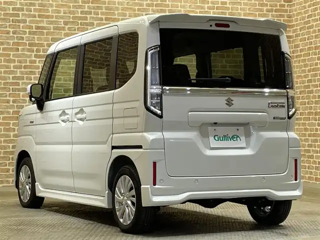 スズキ スペーシア カスタム HYBRID GS 岩手県 2024(令6)年 0.3万km ピュアホワイトP ４WD/全方位モニター/左側パワースライドドア/スズキセーフティサポート/デュアルセンサーブレーキサポートII/車線逸脱抑制機能/アダプティブクルーズコントロール/車線維持支援機能/誤発進抑制機能/先行車発信お知らせ機能/標識認識機能/ハイビームアシスト/ブレーキホールド機能/パーキングセンサー/横滑り防止装置/アイドリングストップ/マニュアルレベリングLEDヘッドランプ/LEDランプ/純正14インチアルミホイール/ロールサンシェード/前席シートヒーター/純正メモリナビ/フルセグTV/AppleCarPlay・AndroidAuto/ステアリングスイッチ/純正フロアマット