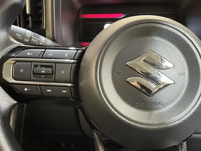 スズキ スペーシア カスタム HYBRID GS 岩手県 2024(令6)年 0.3万km ピュアホワイトP ４WD/全方位モニター/左側パワースライドドア/スズキセーフティサポート/デュアルセンサーブレーキサポートII/車線逸脱抑制機能/アダプティブクルーズコントロール/車線維持支援機能/誤発進抑制機能/先行車発信お知らせ機能/標識認識機能/ハイビームアシスト/ブレーキホールド機能/パーキングセンサー/横滑り防止装置/アイドリングストップ/マニュアルレベリングLEDヘッドランプ/LEDランプ/純正14インチアルミホイール/ロールサンシェード/前席シートヒーター/純正メモリナビ/フルセグTV/AppleCarPlay・AndroidAuto/ステアリングスイッチ/純正フロアマット