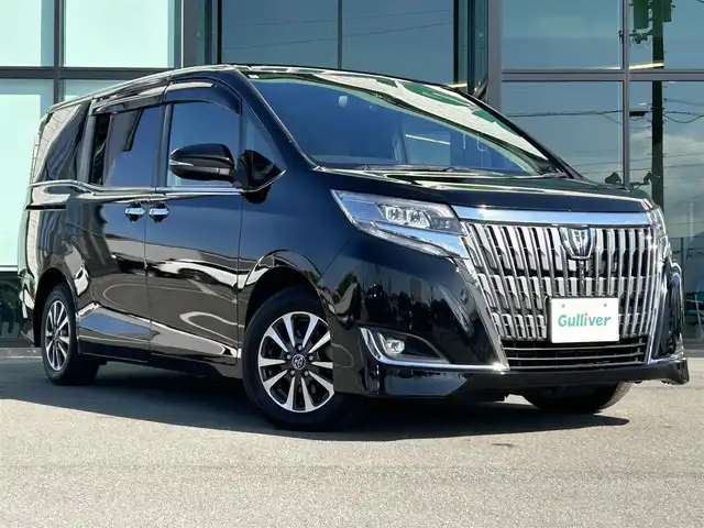 トヨタ エスクァイア Gi プレミアムパッケージ 愛媛県 2018(平30)年 7.9万km ブラック ALPINEビックX11型ナビ(Bluetooth/フルセグTV)/ALPINEフリップダウンモニター/バックカメラ/両側パワースライドドア/茶色ハーフレザーシート/シートヒーター/トヨタセーフティセンス/衝突被害軽減装置/車線逸脱防止装置/クルーズコントロール/LEDヘッドライト/オートライト/オートマチックハイビーム/ステアリングヒーター/ステアリングリモコン/HDMI入力端子/アイドリングストップ/現状サマー(純正AW)(195/65/R15)/YOKOHAMA BluEarth-ES ES32/禁煙車