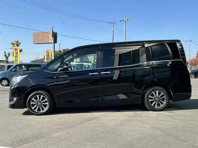 トヨタ エスクァイア Gi プレミアムパッケージ 愛媛県 2018(平30)年 7.9万km ブラック ALPINEビックX11型ナビ(Bluetooth/フルセグTV)/ALPINEフリップダウンモニター/バックカメラ/両側パワースライドドア/茶色ハーフレザーシート/シートヒーター/トヨタセーフティセンス/衝突被害軽減装置/車線逸脱防止装置/クルーズコントロール/LEDヘッドライト/オートライト/オートマチックハイビーム/ステアリングヒーター/ステアリングリモコン/HDMI入力端子/アイドリングストップ/現状サマー(純正AW)(195/65/R15)/YOKOHAMA BluEarth-ES ES32/禁煙車