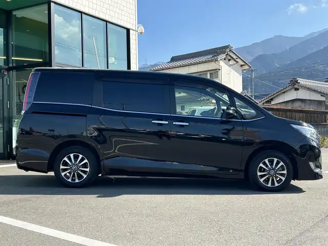 トヨタ エスクァイア Gi プレミアムパッケージ 愛媛県 2018(平30)年 7.9万km ブラック ALPINEビックX11型ナビ(Bluetooth/フルセグTV)/ALPINEフリップダウンモニター/バックカメラ/両側パワースライドドア/茶色ハーフレザーシート/シートヒーター/トヨタセーフティセンス/衝突被害軽減装置/車線逸脱防止装置/クルーズコントロール/LEDヘッドライト/オートライト/オートマチックハイビーム/ステアリングヒーター/ステアリングリモコン/HDMI入力端子/アイドリングストップ/現状サマー(純正AW)(195/65/R15)/YOKOHAMA BluEarth-ES ES32/禁煙車