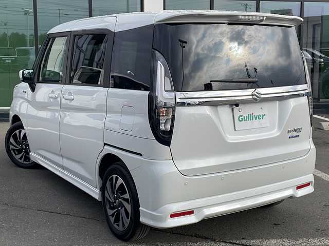 スズキ ソリオ バンディット HV MV 道東・釧路十勝 2024(令6)年 1.5万km ピュアホワイトP ・４WD/・社外SDナビ/（BT・ラジオ）/・バックカメラ/・両側パワースライドドア/・レーダークルーズコントロール/・スズキセーフティサポート/・ドライブレコーダー/・アイドリングストップ/・前席シートヒーター/・横滑り防止装置/・前後コーナーセンサー/・LEDヘッドライト/・レーンキープアシスト/・衝突被害軽減ブレーキ/・保証書/・取扱説明書