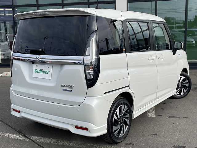 スズキ ソリオ バンディット HV MV 道東・釧路十勝 2024(令6)年 1.5万km ピュアホワイトP ・４WD/・社外SDナビ/（BT・ラジオ）/・バックカメラ/・両側パワースライドドア/・レーダークルーズコントロール/・スズキセーフティサポート/・ドライブレコーダー/・アイドリングストップ/・前席シートヒーター/・横滑り防止装置/・前後コーナーセンサー/・LEDヘッドライト/・レーンキープアシスト/・衝突被害軽減ブレーキ/・保証書/・取扱説明書