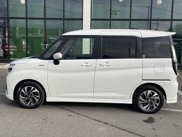 スズキ ソリオ バンディット HV MV 道東・釧路十勝 2024(令6)年 1.5万km ピュアホワイトP ・４WD/・社外SDナビ/（BT・ラジオ）/・バックカメラ/・両側パワースライドドア/・レーダークルーズコントロール/・スズキセーフティサポート/・ドライブレコーダー/・アイドリングストップ/・前席シートヒーター/・横滑り防止装置/・前後コーナーセンサー/・LEDヘッドライト/・レーンキープアシスト/・衝突被害軽減ブレーキ/・保証書/・取扱説明書