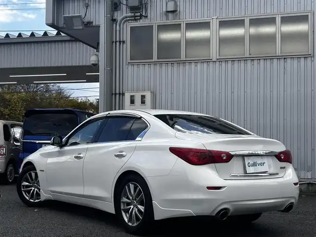 日産 スカイライン ハイブリッド 350GT 静岡県 2014(平26)年 5.7万km クリスタルホワイトパール ユーザー買取車両/純正HDDナビ【AM/FM/TV/BT/CD/iPod】/純正LEDヘッドライト/エンジンスタートボタン/MTモード付AT/クルーズコントロール/バックカメラ/ETC/USB入力端子/パワーシート/レザーシート/純正17インチAW/横滑り防止装置/コーナーセンサー/スマートキー/スペアキー×2/保証書/取扱説明書