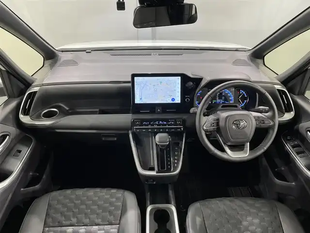 トヨタ ヴォクシー ハイブリッド S－Z 愛知県 2024(令6)年 0.9万km ホワイトパールクリスタルシャイン モデリスタエアロ　F/S/R/サイドステップ/純正10.5インチナビ/（フルセグTV/AM/FM/Bluetooth）/両側パワースライドドア/レーダークルーズコントロール/１００V電源/ビルトインETC2.0/シートヒーター/バックカメラ/前後ドライブレコーダー/ステアリングヒーター/コーナーセンサー/レーンキープアシスト/パーキングアシスト/HDMI接続/プッシュスタート/スマートキー/スペアキー/純正フロアマット/純正17インチアルミホイール/オートライト