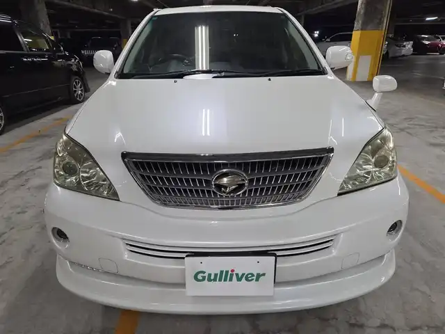 トヨタ ハリアー ハイブリッド L アルカンターラ プライムバージョン 愛媛県 2010(平22)年 8.1万km ホワイトパールクリスタルシャイン 4WD/ムーンルーフ/純正ナビ/フルセグTV/JBLプレミアムサウンドシステム/パワーバックドア/バックカメラ/クルーズコントロール/クリアランスソナー/バックソナー/ステアリング連動HIDヘッドランプ/オートライト/オートエアコン/革巻きステアリング/ステアリングスイッチ/革/アルカンターラコンビシート/前席パワーシート/純正18インチアルミホイール/スマートキー/プッシュエンジンスタート/イモビライザー/オートアラーム/禁煙車