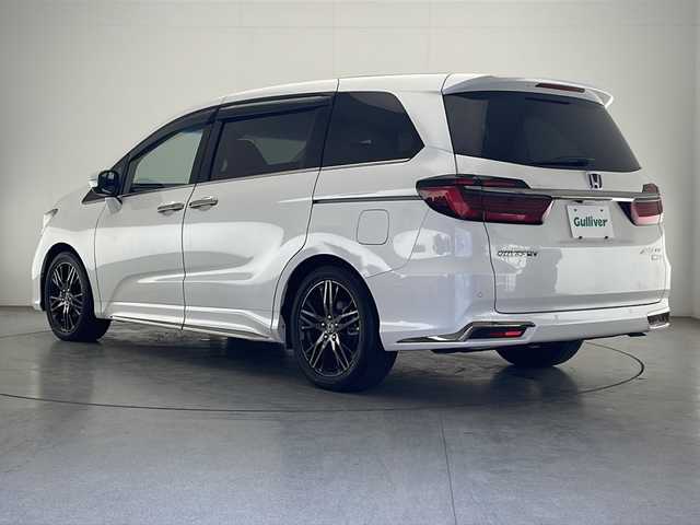 ホンダ オデッセイ ハイブリッド e:HEVアブソルート EX 宮崎県 2022(令4)年 5.4万km プラチナホワイトパール 禁煙車/ホンダセンシング/純正10型プレミアムインターナビTV/（VXU-227DYi/CD/DVD/Bluetooth/フルセグTV)/純正ビルトイン2.0ETC/純正ドライブレコーダー/純正LEDオートライト/純正LEDフォグ/純正18インチアルミ/純正エアロ/純正ルーフエンドスポイラー/純正フロアマット/ハンズフリー両側電動スライドドア/アダプティブクルーズコントロール/レーンディパーチャーアラート/ブラインドスポットモニター/クリアランスソナー/電子パーキング/ブレーキホールド/黒本革シート/パワーバックドア/前席パワーシート/シートヒーター/デュアルオートエアコン/スマートキー/プッシュエンジンスタート/スペアキー/新車時保証書/取扱い説明書
