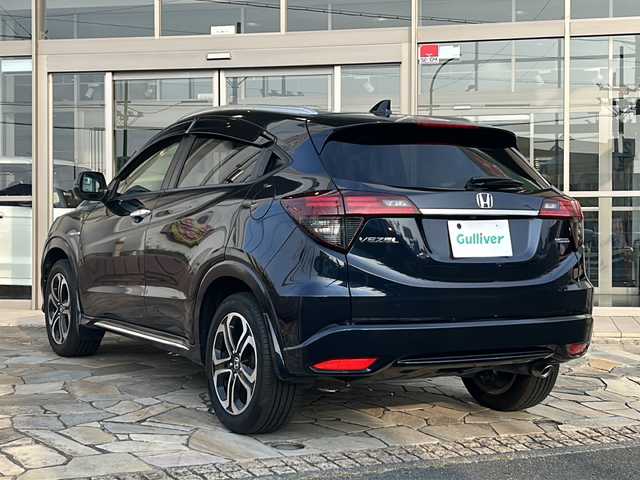 ホンダ ヴェゼル ハイブリッド Z ホンダセンシング 静岡県 2019(令1)年 4.3万km ミッドナイトブルービームM 純正ナビ/・CD/DVD/・FM/AM/・フルセグTV/・SD/Music Rack/・USB/HDMI/・Bluetooth/ホンダセンシング/●衝突軽減ブレーキ〈CMBS〉/●誤発進抑制機能/●歩行者事故低減ステアリング/●路外逸脱抑制機能/●ACC〈アダプティブ・クルーズ・コントロール〉/●LKAS〈車線維持支援システム〉/●先行車発進お知らせ機能/●標識認識機能/主要装備/・サイドカーテンエアバッグ/・LEDヘッドライト/・ハーフレザーシート/・運転席+助手席シートヒーター/・ルーフレール/・ビルトインETC/・アイドリングストップ/・パドルシフト/・横滑り防止装置/・ドライブレコーダー