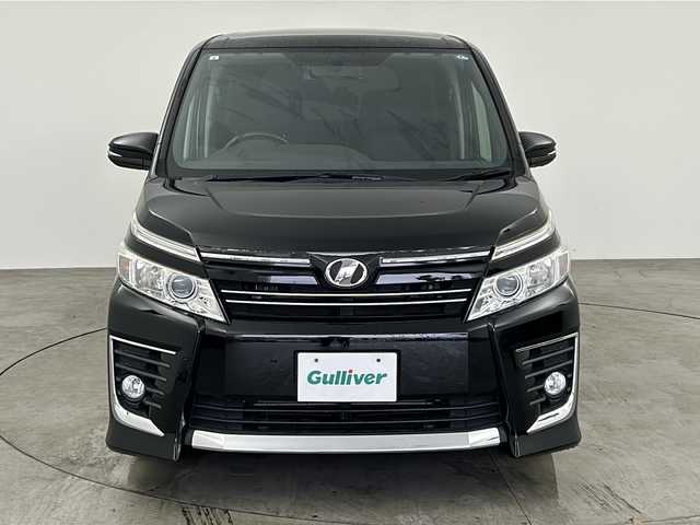 トヨタ ヴォクシー ZS 煌 兵庫県 2015(平27)年 10.7万km ブラック ・純正ナビ&TV&BT&CD&DVD&SD/・バックカメラ/・両側パワースライドドア/・ビルトインETC/・純正16インチアルミホイール/・純正フロアマット/・スマートキー/・横滑り防止/・LEDオートライト/・アイドリングストップ