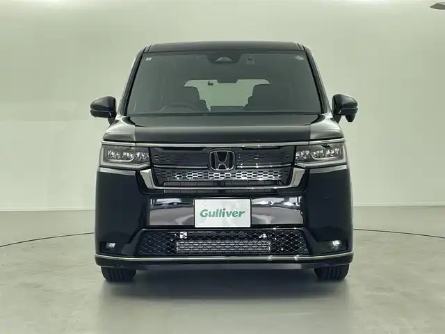 ホンダ ステップワゴン スパーダ 福井県 2024(令6)年 0.6万km クリスタルブラックパール 9型純正ナビ　/【AM/FM/CD/DVD/Bluetooth/フルセグ】/ホンダセンシング/-車線逸脱警報/-レーンキープアシスト/-BSM/-踏み間違い防止/-オートクルーズコントロール/全方位カメラ/両側パワースライドドア　/パワーバックドア　/ハーフレザーシート　/シートヒーター　/LEDライト/ETC/ドライブレコーダー前後