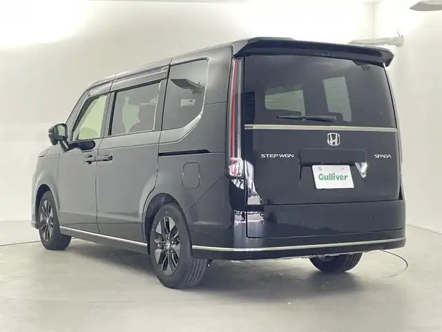 ホンダ ステップワゴン スパーダ 福井県 2024(令6)年 0.6万km クリスタルブラックパール 9型純正ナビ　/【AM/FM/CD/DVD/Bluetooth/フルセグ】/ホンダセンシング/-車線逸脱警報/-レーンキープアシスト/-BSM/-踏み間違い防止/-オートクルーズコントロール/全方位カメラ/両側パワースライドドア　/パワーバックドア　/ハーフレザーシート　/シートヒーター　/LEDライト/ETC/ドライブレコーダー前後