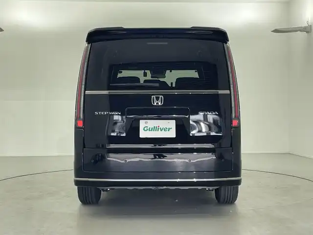 ホンダ ステップワゴン スパーダ 福井県 2024(令6)年 0.6万km クリスタルブラックパール 9型純正ナビ　/【AM/FM/CD/DVD/Bluetooth/フルセグ】/ホンダセンシング/-車線逸脱警報/-レーンキープアシスト/-BSM/-踏み間違い防止/-オートクルーズコントロール/全方位カメラ/両側パワースライドドア　/パワーバックドア　/ハーフレザーシート　/シートヒーター　/LEDライト/ETC/ドライブレコーダー前後