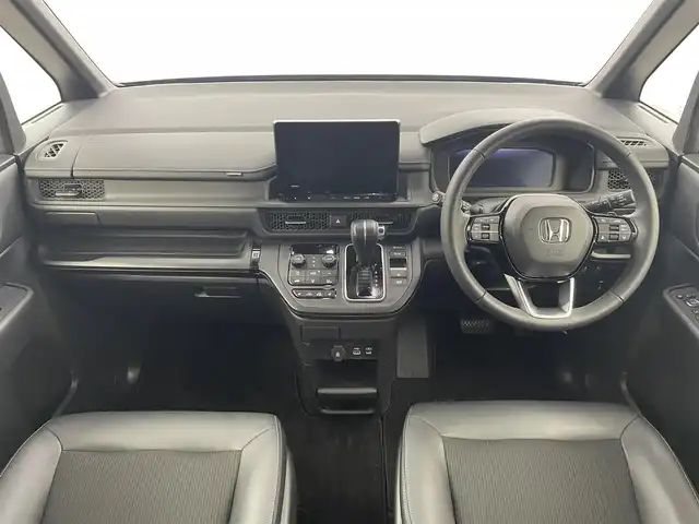 ホンダ ステップワゴン スパーダ 福井県 2024(令6)年 0.6万km クリスタルブラックパール 9型純正ナビ　/【AM/FM/CD/DVD/Bluetooth/フルセグ】/ホンダセンシング/-車線逸脱警報/-レーンキープアシスト/-BSM/-踏み間違い防止/-オートクルーズコントロール/全方位カメラ/両側パワースライドドア　/パワーバックドア　/ハーフレザーシート　/シートヒーター　/LEDライト/ETC/ドライブレコーダー前後