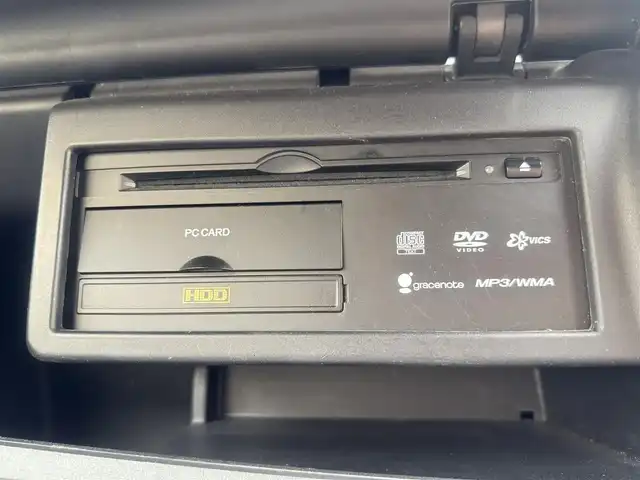 ホンダ ステップワゴン G LSパッケージ 東京都 2005(平17)年 14.2万km ムーンライズメタリック パワースライドドア（助手席側）/イージークローザー（運転席側）/HIDヘッドランプ/フロントフォグランプ/ボディ同色フロント/サイドシル/リア/リアアンダースポイラー/ボディ同色電動格納ドアミラー/ウィンカーミラー/プライバシーガラス/ミラー付サングラスボックス/ブラックインパネ加飾/ウレタン製ステアリングホイール/SRSエアバッグ（運転席/助手席）/オートエアコン/リアクーラー/シートリフター（運転席）/シートバックポケット（運転席側/助手席側）/6：4分割タンブルシート（2列目）/8人乗り/カーテシーランプ（リア）/イモビライザー/セキュリティアラーム/リモコンキー/オーディオ無/4スピーカー/親水/ヒーテッドドアミラー/フロントドア撥水ガラス/ETC/ECON/DVDプレーヤー/ドアバイザー
