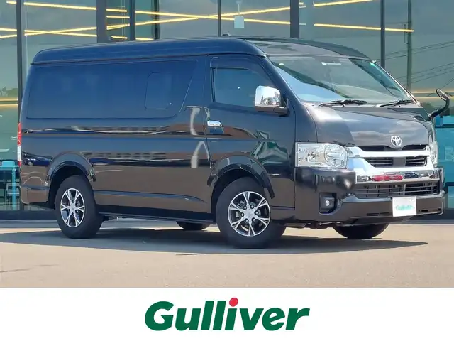トヨタ ハイエース GL 東京都 2022(令4)年 1万km ブラックマイカ 純正ナビ/フルセグ/フリップダウンモニター/パノラミックビューモニター/ビルトインETC2.0/純正15インチAW/パワースライドドア/トヨタセーフティセンス/AC100V/オートマチックハイビーム/スマートキー
