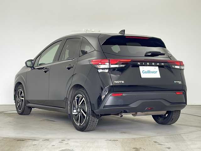 日産 ノート X FOUR 秋田県 2022(令4)年 1.2万km スーパーブラック 4WD/エマージェンシーブレーキ/寒冷地仕様/純正メモリナビ/　（Bluetooth/フルセグTV/HDMI）/バックカメラ/全方位カメラ/プロパイロット/ステアリングヒーター/ステアリングスイッチ/革巻きハンドル/デジタルインナーミラー/前席シートヒーター/置くだけ充電/電動格納ミラー/ETC2.0/純正フロアマット/純正16インチアルミホイール/クリアランスソナー/LEDヘッドライト/フォグランプ/オートライト/スマートキー