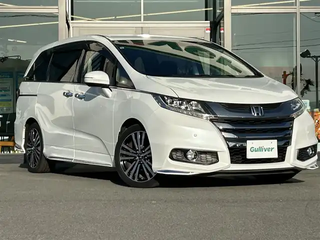 ホンダ オデッセイ アブソルート・EXホンダセンジング 愛媛県 2017(平29)年 5.3万km ホワイトオーキッドパール 純正8型ナビ/バックカメラ/両側電動スライド/ブラインドスポットモニター/アダプティブクルーズコントロール/パドルシフト/半革電動シート/クリアランスソナー/LEDヘッドライト/後付け大型アームレスト/ドアバイザー/シガーソケット/ステアリングリモコン/電格ミラー/ヒートミラー/現状サマー(純正AW)(225/45/R18)/Continental ContiMAXContactMC5