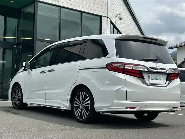 ホンダ オデッセイ アブソルート・EXホンダセンジング 愛媛県 2017(平29)年 5.3万km ホワイトオーキッドパール 純正8型ナビ/バックカメラ/両側電動スライド/ブラインドスポットモニター/アダプティブクルーズコントロール/パドルシフト/半革電動シート/クリアランスソナー/LEDヘッドライト/後付け大型アームレスト/ドアバイザー/シガーソケット/ステアリングリモコン/電格ミラー/ヒートミラー/現状サマー(純正AW)(225/45/R18)/Continental ContiMAXContactMC5