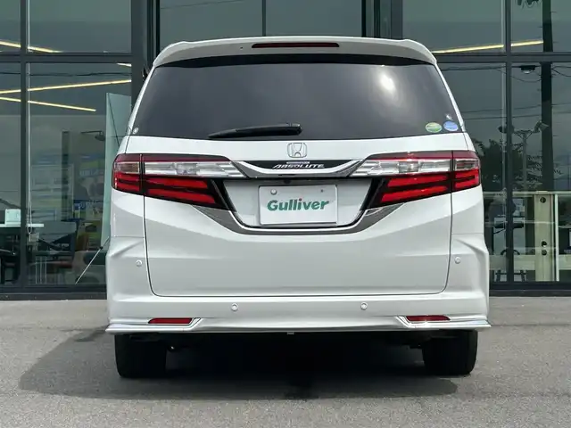 ホンダ オデッセイ アブソルート・EXホンダセンジング 愛媛県 2017(平29)年 5.3万km ホワイトオーキッドパール 純正8型ナビ/バックカメラ/両側電動スライド/ブラインドスポットモニター/アダプティブクルーズコントロール/パドルシフト/半革電動シート/クリアランスソナー/LEDヘッドライト/後付け大型アームレスト/ドアバイザー/シガーソケット/ステアリングリモコン/電格ミラー/ヒートミラー/現状サマー(純正AW)(225/45/R18)/Continental ContiMAXContactMC5