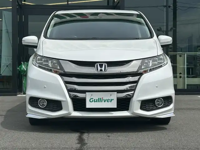 ホンダ オデッセイ アブソルート・EXホンダセンジング 愛媛県 2017(平29)年 5.3万km ホワイトオーキッドパール 純正8型ナビ/バックカメラ/両側電動スライド/ブラインドスポットモニター/アダプティブクルーズコントロール/パドルシフト/半革電動シート/クリアランスソナー/LEDヘッドライト/後付け大型アームレスト/ドアバイザー/シガーソケット/ステアリングリモコン/電格ミラー/ヒートミラー/現状サマー(純正AW)(225/45/R18)/Continental ContiMAXContactMC5