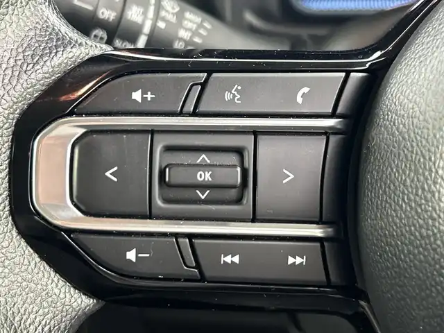 スズキ スペーシア HYBRID X 愛知県 2024(令6)年 0.7万km シフォンアイボリーM 禁煙車/ワンオーナー/7インチナビ/（AM/FM/Bluetooth）/バックカメラ/スズキセーフティサポート/・衝突軽減ブレーキ/・レーンキープアシスト/・オートマチックハイビーム/コーナーセンサー/ドライブレコーダー/ETC/シートヒーター/ベンチシート/両側パワースライドドア/アイドリングストップ/純正フロアマット/LEDヘッドライト/横滑り防止装置/オートエアコン/スマートキー/プッシュスタート