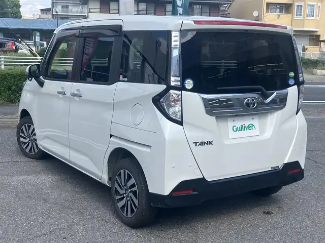 トヨタ タンク カスタムG 愛知県 2019(令1)年 5.7万km パールホワイトⅢ スマートアシスト/衝突回避支援ブレーキサポート/純正SDナビTV/Bluetoothオーディオ/バックカメラ/スマートキー×2ヶ/プッシュスタート/クルーズコントロール/前後2カメラドライブレコーダー/両側パワースライドドア/ETC/LEDヘッドライト/オートライト/オートマチックハイビーム/アイドルストップ/純正アルミホイル/純正フロアマット/保証書取説有り