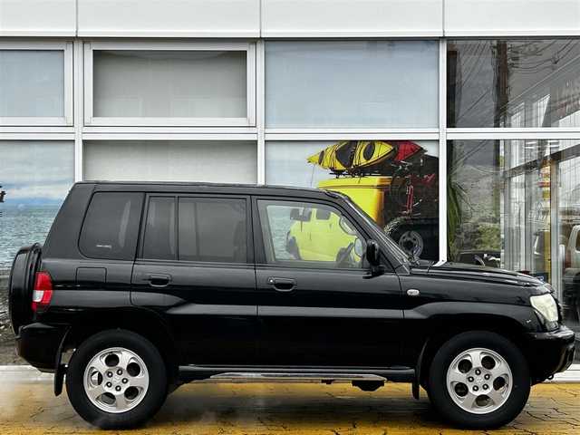 三菱 パジェロ イオ パールパッケージ ナビED 道北・旭川 2002(平14)年 3.7万km ピレネーブラック 走行距離36700キロ/運転席助手席エアバック/純正アルミホイール/電動格納ドアミラー/オートエアコン/ABS/背面タイヤ/社外ドライブレコーダー