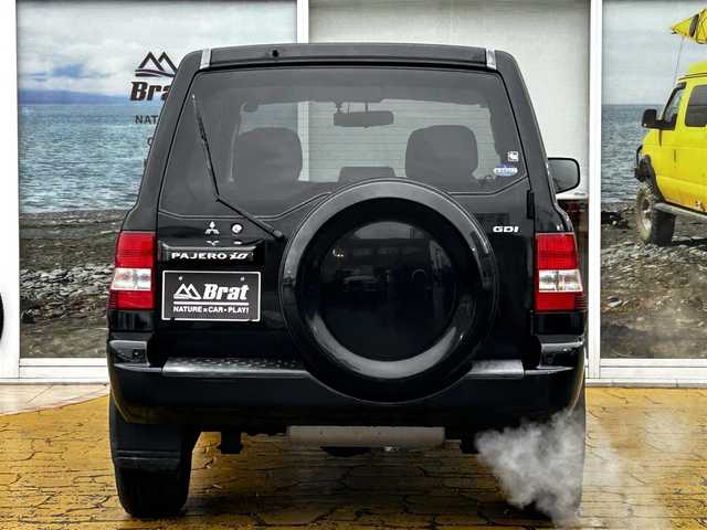 三菱 パジェロ イオ パールパッケージ ナビED 道北・旭川 2002(平14)年 3.7万km ピレネーブラック 走行距離36700キロ/運転席助手席エアバック/純正アルミホイール/電動格納ドアミラー/オートエアコン/ABS/背面タイヤ/社外ドライブレコーダー