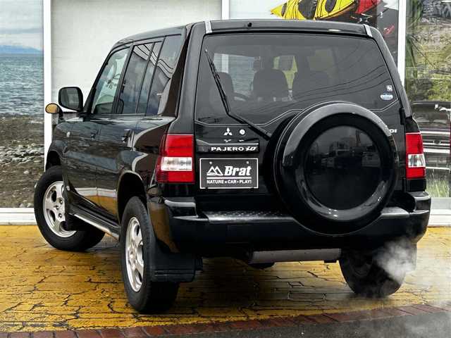 三菱 パジェロ イオ パールパッケージ ナビED 道北・旭川 2002(平14)年 3.7万km ピレネーブラック 走行距離36700キロ/運転席助手席エアバック/純正アルミホイール/電動格納ドアミラー/オートエアコン/ABS/背面タイヤ/社外ドライブレコーダー