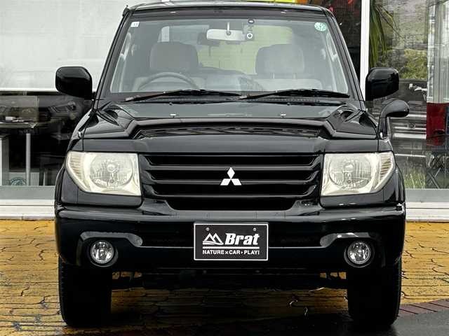 三菱 パジェロ イオ パールパッケージ ナビED 道北・旭川 2002(平14)年 3.7万km ピレネーブラック 走行距離36700キロ/運転席助手席エアバック/純正アルミホイール/電動格納ドアミラー/オートエアコン/ABS/背面タイヤ/社外ドライブレコーダー