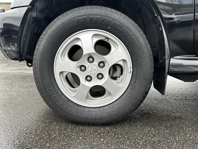 三菱 パジェロ イオ パールパッケージ ナビED 道北・旭川 2002(平14)年 3.7万km ピレネーブラック 走行距離36700キロ/運転席助手席エアバック/純正アルミホイール/電動格納ドアミラー/オートエアコン/ABS/背面タイヤ/社外ドライブレコーダー