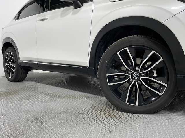 ホンダ ヴェゼル ハイブリッド e:HEV Z 広島県 2021(令3)年 4.8万km プラチナホワイトパール 純正９型ナビ/バックカメラ/シートヒーター/電動リアゲート/ワイヤレス充電/ブラインドスポットモニター/ＥＴＣ２．０/前後ドラレコ/オートハイビーム/ステアリングヒーター/レーダークルーズコントロール/衝突軽減/レーンキープアシスト/踏み間違い防止/純正18インチアルミホイール(225/50/R18)/エアバッグ(運転席/助手席/サイド/カーテン)