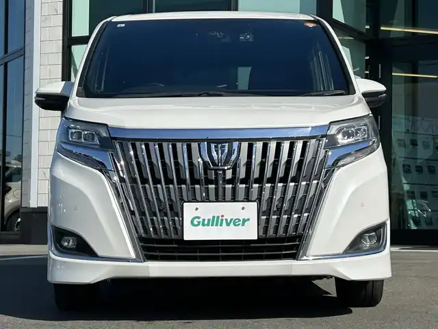 トヨタ エスクァイア Gi 愛媛県 2019(令1)年 7.5万km ホワイトパールクリスタルシャイン 純正9型ナビ(Bluetooth/フルセグTV)/純正12.1型後席モニター/両側パワースライドドア/トヨタセーフティセンス/クルーズコントロール/クリアランスソナー/衝突被害軽減装置/車線逸脱防止装置/LEDヘッドライト/オートライト/オートマチックハイビーム/ブラック合皮シート／シートヒーター/前後ドライブレコーダー/アイドリングストップ/後席サンシェイド/純正フロアマット/純正ドアバイザー/電格ミラー/現状サマー(純正AW)(195/65/R15)/YOKOHAMA BluEarth-ES ES32/禁煙車