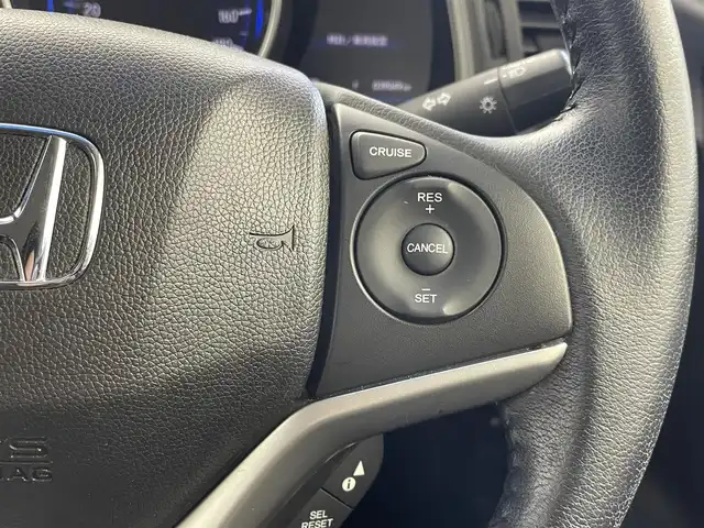 ホンダ フィット ハイブリット Lパッケージ 群馬県 2015(平27)年 3.9万km ティンテッドシルバーM 純正８型ナビ　バックカメラ　ワンセグＴＶ　ＥＴＣ　オートライト　キノセンヘッドライト　衝突被害軽減システム　クルーズコントロール　ＡＢＳ　ハーフレザーシート　スマートキー　オートエアコン　禁煙車