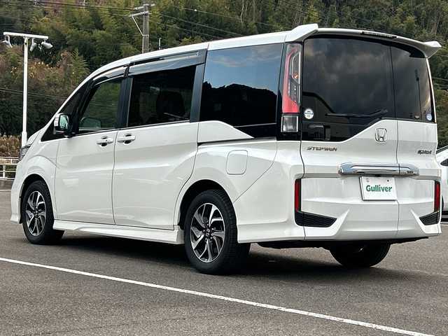 ホンダ ステップワゴン スパーダ ホンダセンシング 佐賀県 2018(平30)年 4.5万km プラチナホワイトパール 純正9インチナビゲーション/純正11.6インチフリップダウンモニター/アダプティブクルーズコントロール/ビルトインETC/バックカメラ/両側パワースライドドア/ワクワクゲート/衝突軽減ブレーキ/路外逸脱抑制機能/先行車発進お知らせ機能/車線維持支援システム/標識認識機能/純正16インチアルミホイール/LEDヘッドライト/フォグランプ/スマートキー