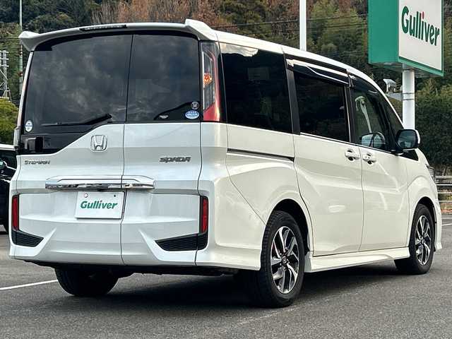ホンダ ステップワゴン スパーダ ホンダセンシング 佐賀県 2018(平30)年 4.5万km プラチナホワイトパール 純正9インチナビゲーション/純正11.6インチフリップダウンモニター/アダプティブクルーズコントロール/ビルトインETC/バックカメラ/両側パワースライドドア/ワクワクゲート/衝突軽減ブレーキ/路外逸脱抑制機能/先行車発進お知らせ機能/車線維持支援システム/標識認識機能/純正16インチアルミホイール/LEDヘッドライト/フォグランプ/スマートキー