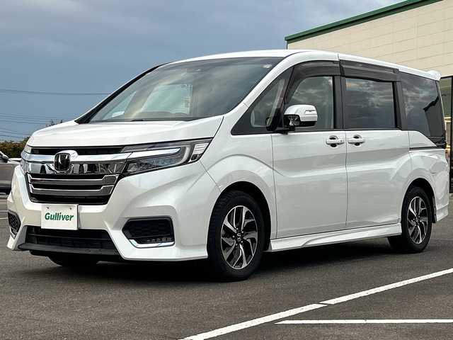 ホンダ ステップワゴン スパーダ ホンダセンシング 佐賀県 2018(平30)年 4.5万km プラチナホワイトパール 純正9インチナビゲーション/純正11.6インチフリップダウンモニター/アダプティブクルーズコントロール/ビルトインETC/バックカメラ/両側パワースライドドア/ワクワクゲート/衝突軽減ブレーキ/路外逸脱抑制機能/先行車発進お知らせ機能/車線維持支援システム/標識認識機能/純正16インチアルミホイール/LEDヘッドライト/フォグランプ/スマートキー