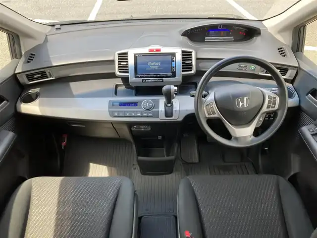 ホンダ フリード ハイブリット ジャストセレクション 鳥取県 2014(平26)年 5.6万km モダンスティールM ワンオーナー/純正ナビ/フルセグ/DVD/CD/BT/バックカメラ/ビルトインETC/両側パワースライド/クルーズコントロール/キセノンヘットライト/社外15インチアルミホイール/純正エアロパーツ/スマートキー/ウィンカーミラー/フロアマット/ドアバイザー/スペアキー