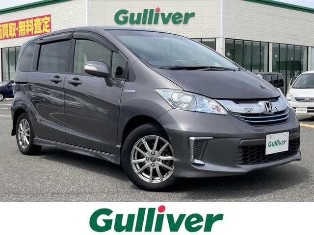 ホンダ フリード ハイブリット ジャストセレクション 鳥取県 2014(平26)年 5.6万km モダンスティールM ワンオーナー/純正ナビ/フルセグ/DVD/CD/BT/バックカメラ/ビルトインETC/両側パワースライド/クルーズコントロール/キセノンヘットライト/社外15インチアルミホイール/純正エアロパーツ/スマートキー/ウィンカーミラー/フロアマット/ドアバイザー/スペアキー