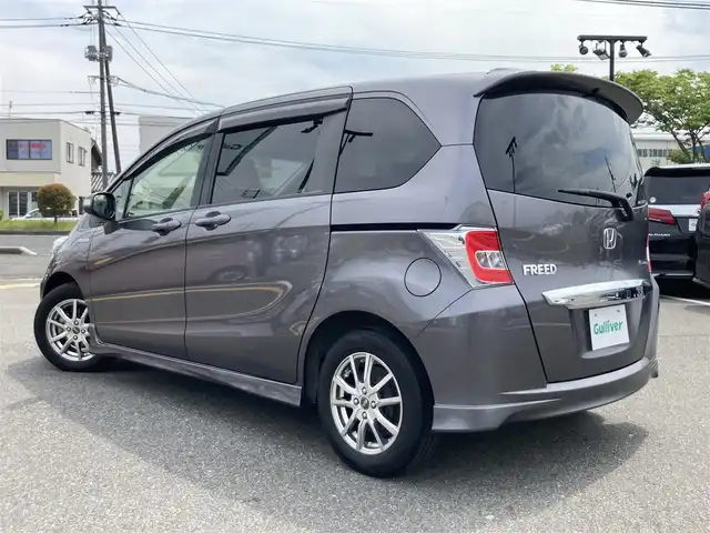 ホンダ フリード ハイブリット ジャストセレクション 鳥取県 2014(平26)年 5.6万km モダンスティールM ワンオーナー/純正ナビ/フルセグ/DVD/CD/BT/バックカメラ/ビルトインETC/両側パワースライド/クルーズコントロール/キセノンヘットライト/社外15インチアルミホイール/純正エアロパーツ/スマートキー/ウィンカーミラー/フロアマット/ドアバイザー/スペアキー