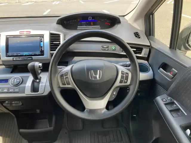 ホンダ フリード ハイブリット ジャストセレクション 鳥取県 2014(平26)年 5.6万km モダンスティールM ワンオーナー/純正ナビ/フルセグ/DVD/CD/BT/バックカメラ/ビルトインETC/両側パワースライド/クルーズコントロール/キセノンヘットライト/社外15インチアルミホイール/純正エアロパーツ/スマートキー/ウィンカーミラー/フロアマット/ドアバイザー/スペアキー