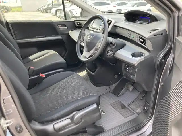 ホンダ フリード ハイブリット ジャストセレクション 鳥取県 2014(平26)年 5.6万km モダンスティールM ワンオーナー/純正ナビ/フルセグ/DVD/CD/BT/バックカメラ/ビルトインETC/両側パワースライド/クルーズコントロール/キセノンヘットライト/社外15インチアルミホイール/純正エアロパーツ/スマートキー/ウィンカーミラー/フロアマット/ドアバイザー/スペアキー