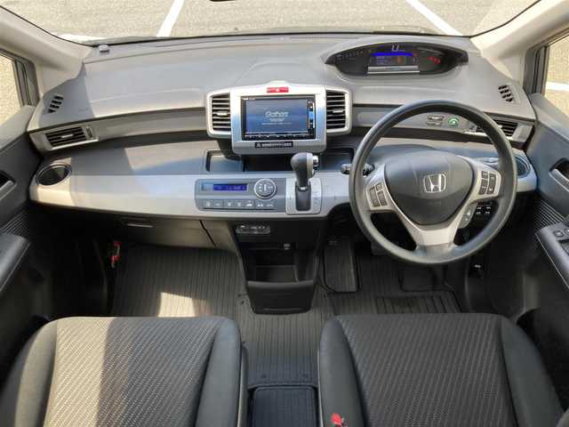 ホンダ フリード ハイブリット ジャストセレクション 大阪府 2014(平26)年 5.6万km モダンスティールM ワンオーナー/純正ナビ/フルセグ/DVD/CD/BT/バックカメラ/ビルトインETC/両側パワースライド/クルーズコントロール/キセノンヘットライト/社外15インチアルミホイール/純正エアロパーツ/スマートキー/ウィンカーミラー/フロアマット/ドアバイザー/スペアキー