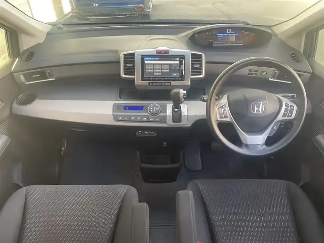 ホンダ フリード ハイブリット ジャストセレクション 愛知県 2014(平26)年 5.6万km モダンスティールM (株)IDOMが運営する【じしゃロン豊川店】の自社ローン専用車両になります。こちらは現金またはオートローンご利用時の価格です。自社ローンご希望の方は別途その旨お申付け下さい/ 純正メーカーナビ/ バックカメラ/ ETC/ 両側パワースライドドア/ ステアリングスイッチ/ ドアバイザー/ ウインカーミラー/ 純正フロアマット