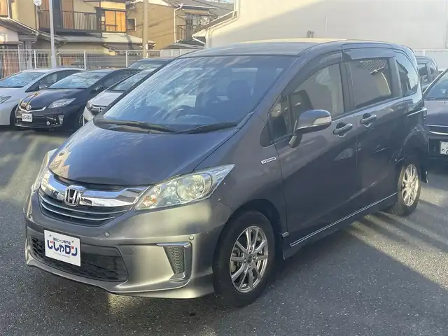 ホンダ フリード ハイブリット ジャストセレクション 愛知県 2014(平26)年 5.6万km モダンスティールM (株)IDOMが運営する【じしゃロン豊川店】の自社ローン専用車両になります。こちらは現金またはオートローンご利用時の価格です。自社ローンご希望の方は別途その旨お申付け下さい/ 純正メーカーナビ/ バックカメラ/ ETC/ 両側パワースライドドア/ ステアリングスイッチ/ ドアバイザー/ ウインカーミラー/ 純正フロアマット