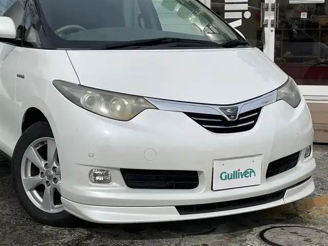 トヨタ エスティマ ハイブリッド G 神奈川県 2006(平18)年 3.5万km ホワイトパールクリスタルシャイン メーカーOP HDDナビ/　（CD・DVD）/フルセグTV/純正フリップダウンモニター/両側パワースライドドア/前後コーナーセンサー/ビルトインETC/純正17インチAW/クルーズコントロール/スマートキー/保証書/取扱説明書