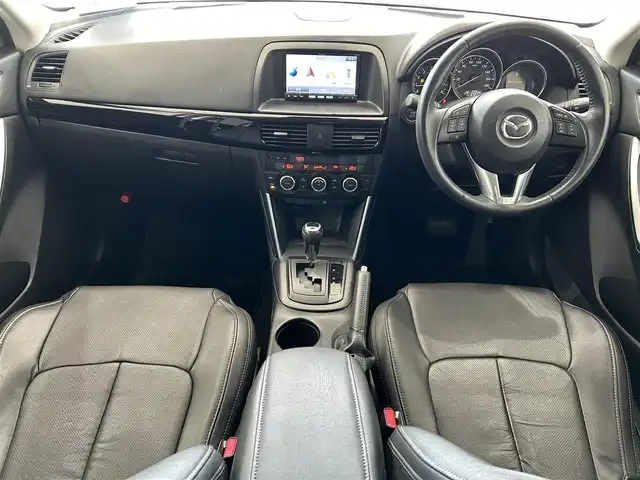 マツダ ＣＸ－５ 20S 沖縄県 2013(平25)年 4.2万km ソウルレッドプレミアムメタリック (株)IDOMが運営する【じしゃロンOO店】の自社ローン専用車両になりますこちらは現金またはオートローンご利用時の価格です。自社ローンご希望の方は別途その旨お申付け下さい/・プッシュスタート　/・ナビ　/・ＴＶ　/・Ｂｌｕｅｔｏｏｔｈ接続　/・バックカメラ　/・クルーズコントロール　/・純正フロアマット　/・純正アルミホイール　/・スマートキー　/・ＡＢＳ　/・アイドリングストップ