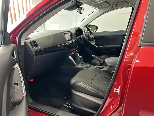 マツダ ＣＸ－５ 20S 沖縄県 2013(平25)年 4.2万km ソウルレッドプレミアムメタリック (株)IDOMが運営する【じしゃロンOO店】の自社ローン専用車両になりますこちらは現金またはオートローンご利用時の価格です。自社ローンご希望の方は別途その旨お申付け下さい/・プッシュスタート　/・ナビ　/・ＴＶ　/・Ｂｌｕｅｔｏｏｔｈ接続　/・バックカメラ　/・クルーズコントロール　/・純正フロアマット　/・純正アルミホイール　/・スマートキー　/・ＡＢＳ　/・アイドリングストップ